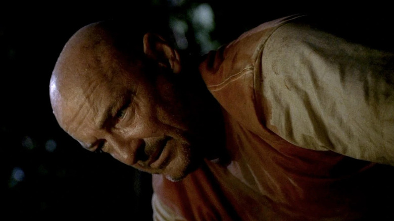 John Locke crouching