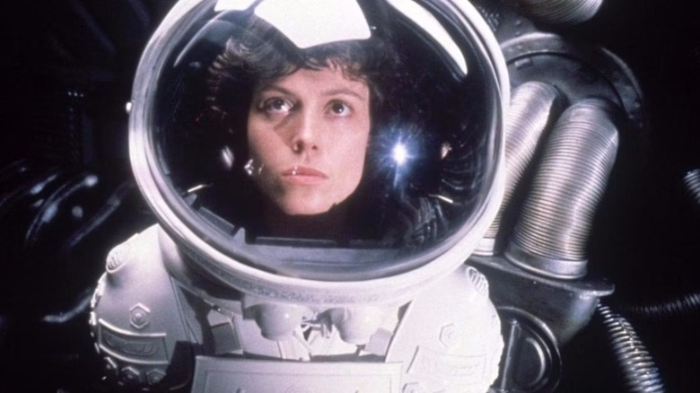 Alien Ripley stares up in her spacesuit