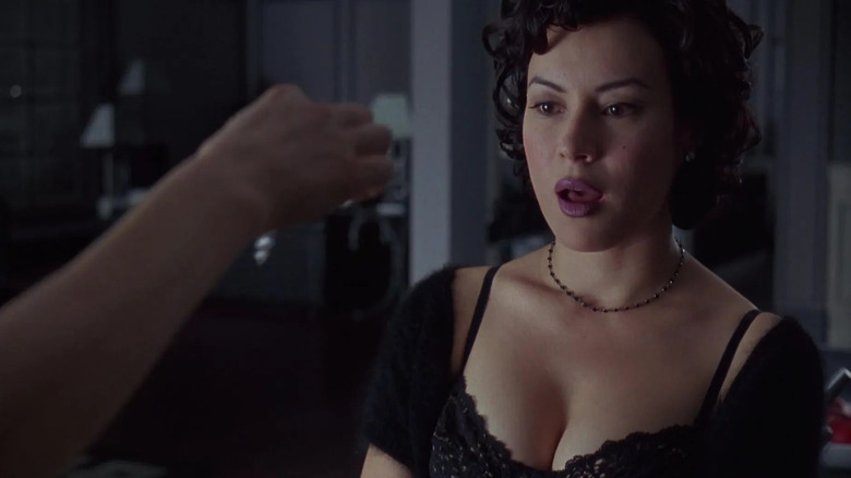 Jennifer Tilly acts shocked in "Bound"