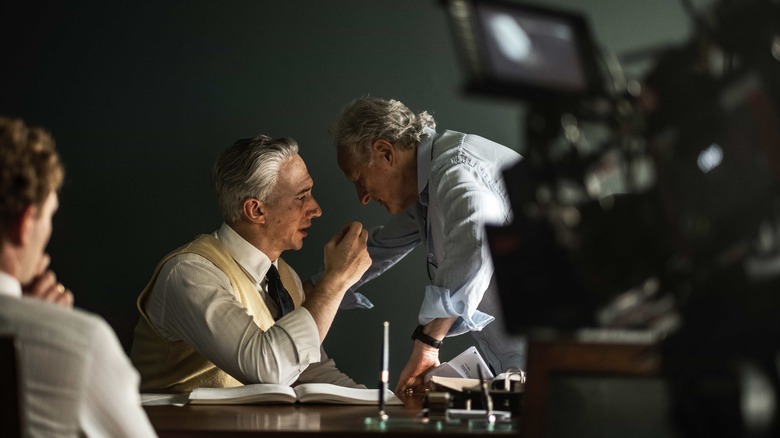 Adam Driver and Michael Mann on the set of Ferrari