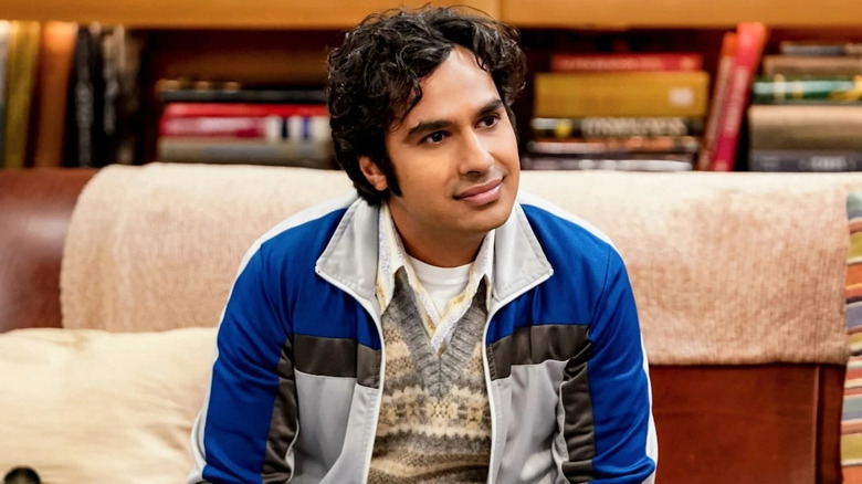 Raj blue jacket smiling