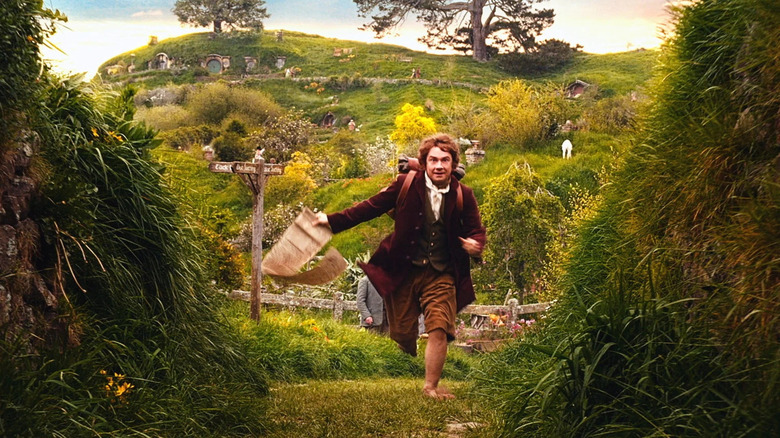 Martin Freeman running in The Shire as Bilbo in The Hobbit: An Unexpected Journey