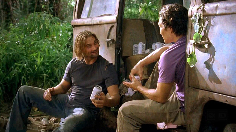 Sawyer and Jin drink beers in van Lost